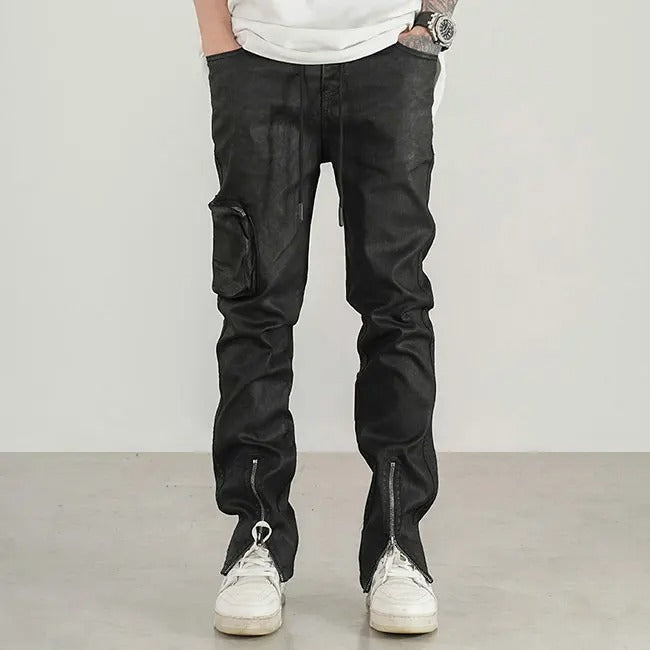 Black slim-fit trousers with cargo pocket and zip hems
