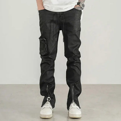 Black slim-fit trousers with cargo pocket and zip hems