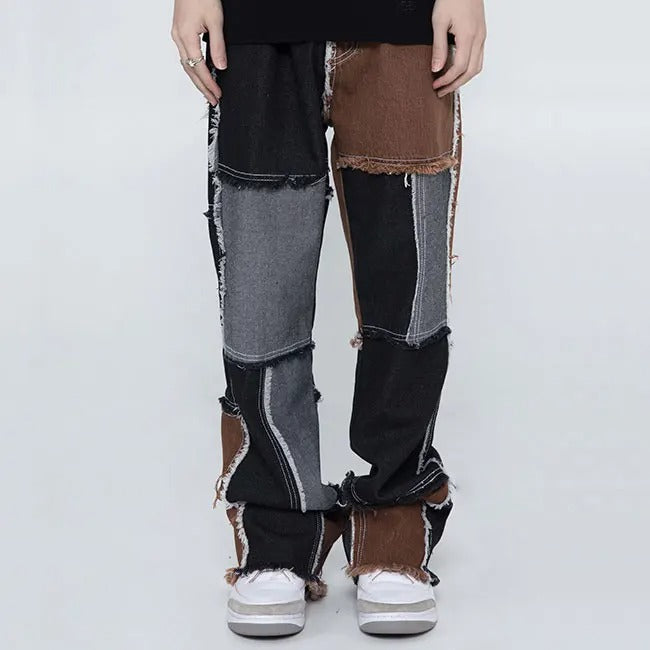 Multi-colour patchwork jeans with frayed panel edges