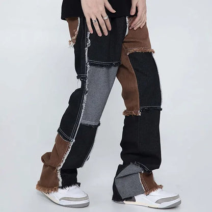 Multi-colour patchwork jeans with frayed panel edges