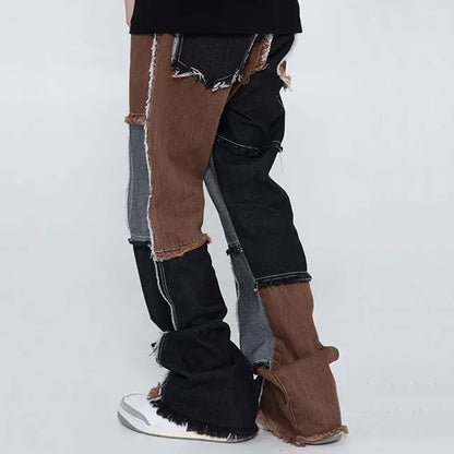 Multi-colour patchwork jeans with frayed panel edges