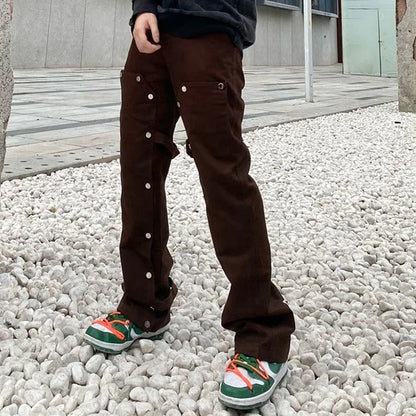 Brown straight-leg trousers with snap button detailing