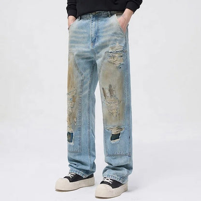 Light blue distressed jeans with faded wash and ripped details