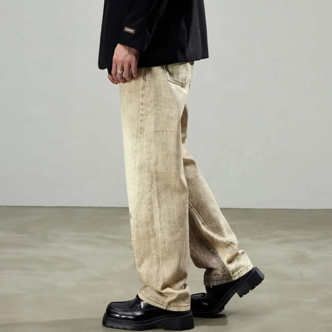 Beige wide-leg jeans with faded wash
